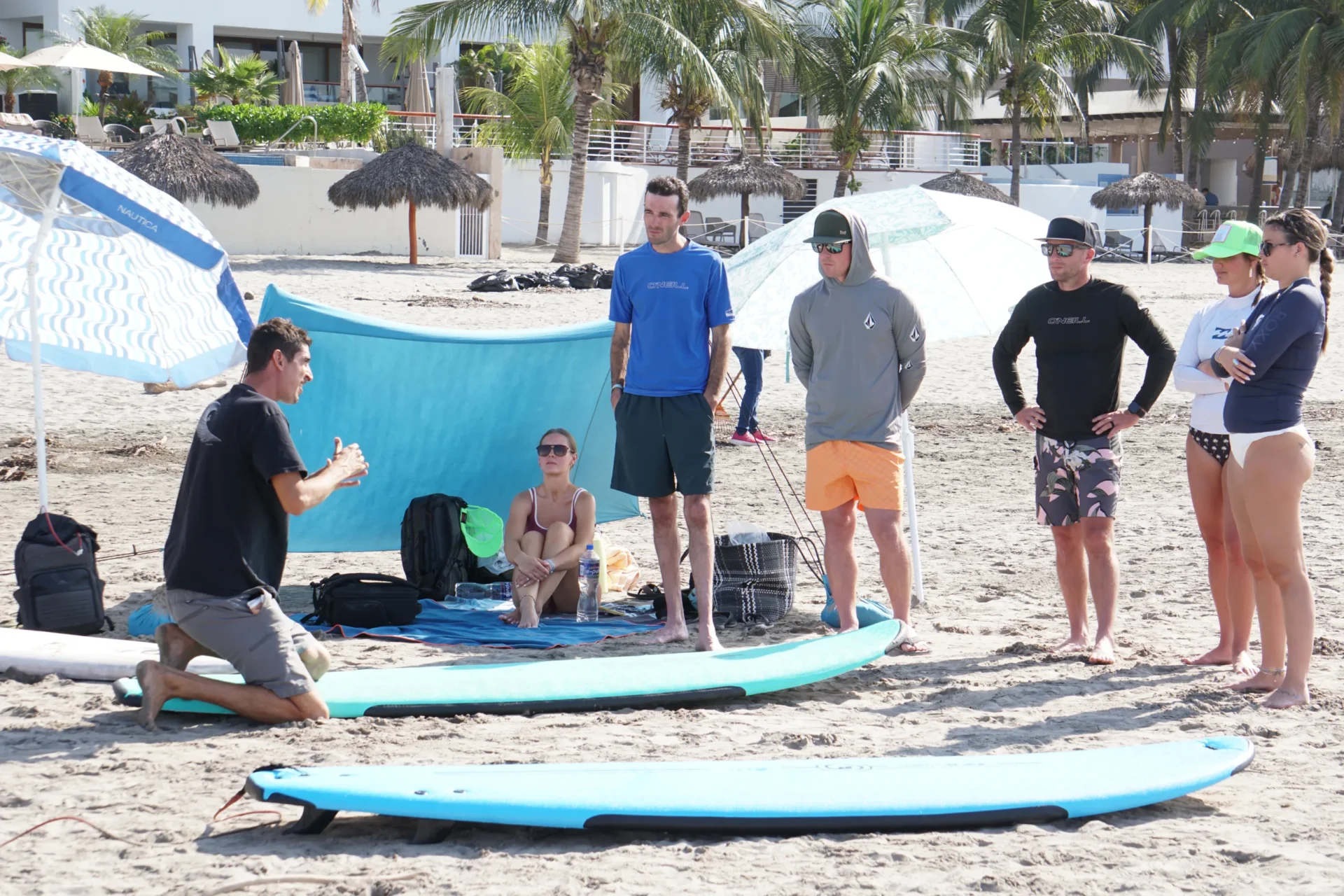 Instructor briefing before surfing lesson